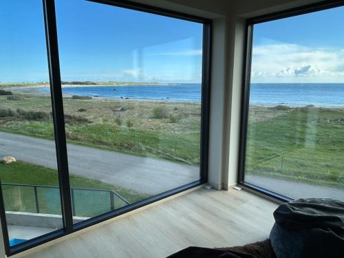 House with pool and steam bath on the beach! in Borhaug