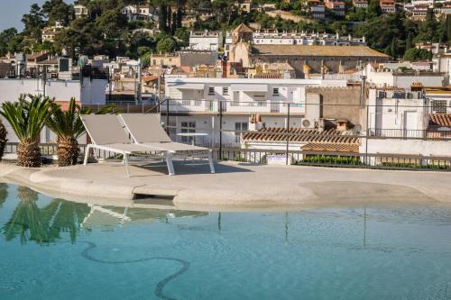 Úszómedence, Hotel Delfin 4 Sup in Tossa de Mar