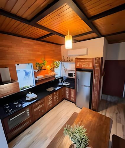 Kitchen, Cabana Jardim dos Passaros com Hidro e Lareira in São Pedro De Alcântara