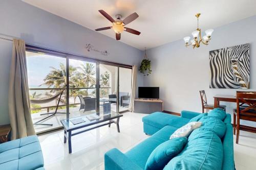 Beachfront condo with balcony sea view partial AC pool dock & kayaks in Ambergris Caye