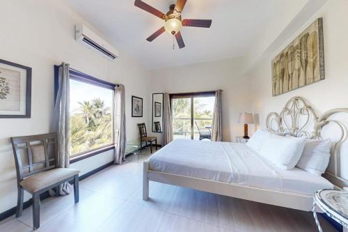Serene oceanfront condo with shared pool ocean view WiFi & partial AC in Ambergris Caye