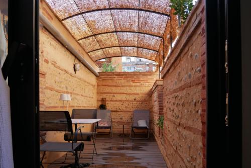 Le Home du Tigre, une adresse de charme avec terrasse et jardin secret, au cœur de Toulouse