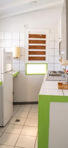 Kitchen, Maison confortable a Baie-Mahault avec climatisation in Baie-Mahault