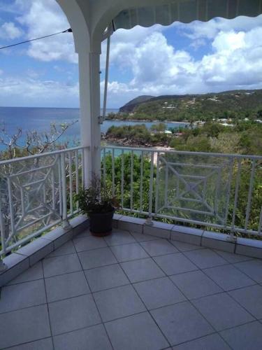 Balcony/terrace, Maison accueillante avec vue sur la mer a Deshaies + Terrasse in Deshaies