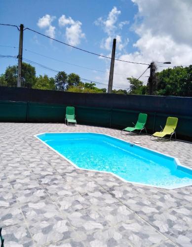 ทัศนียภาพ, Maison confortable à Le Moule avec piscine partagée (Maison confortable a Le Moule avec piscine partagee) in เลอ มูล์