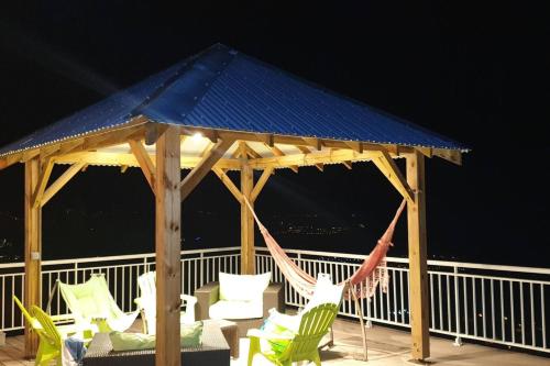 ระเบียง/ชานเรือน, Villa moderne au Diamant avec piscine privée (Villa moderne au Diamant avec piscine privee) in เลอ ยามัน