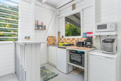 ห้องครัว, Appartement charmant au Carbet avec vue sur la mer - 50 m² in เลอการ์เบ