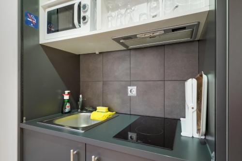 Kitchen, Modern studio in Arinsal of 40 m² with mountain view in Arinsal