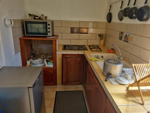 virtuve, Maison charmante au Robert avec jardin et tennis à proximité (Maison charmante au Robert avec jardin et tennis a proximite) in Le Robert