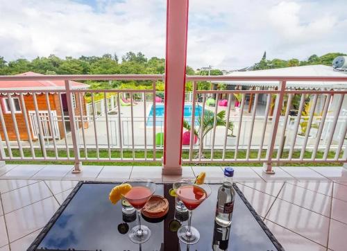 balkon/terras, Maison lumineuse avec piscine au Moule in Le Moule