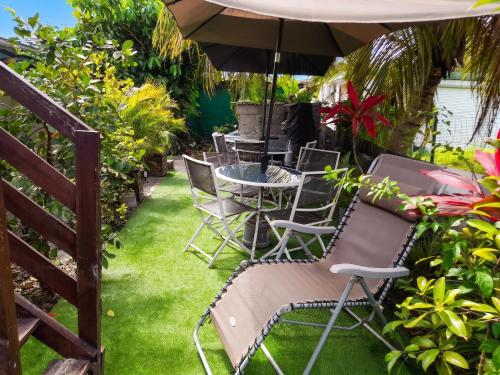 ระเบียง/ชานเรือน, Appartement charmant à Sainte-Rose de 40 m² avec piscine (Appartement charmant a Sainte-Rose de 40 m² avec piscine) in ซานต์ โรเซ