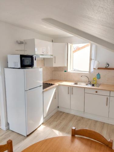 кухня, Appartement confortable à Rosny-sous-Bois, 38m² + Vue sur la ville (Appartement confortable a Rosny-sous-Bois, 38m² + Vue sur la ville) in Росні-су-Буа