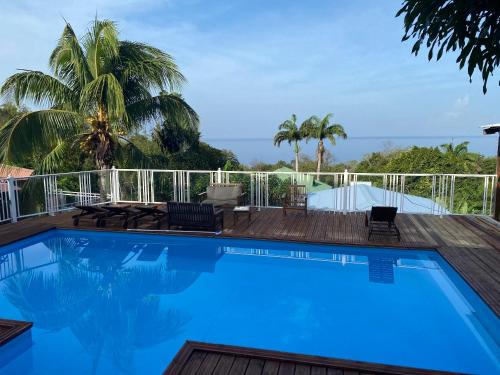 Maison en bord de mer à Pointe-Noire avec piscine partagée - Location saisonnière - Pointe-Noire