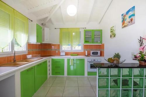 Kitchen, Maison charmante a Le Moule avec piscine partagee in Le Moule