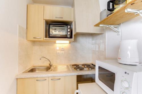 Konyha, Appartement convivial a Thollon-les-Memises, 35 m², vue montagne in Thollon-les-Memises
