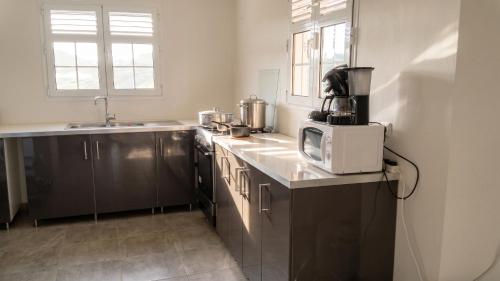 Cozinha, Appartement spacieux avec vue montagne à Le Marin, 82 m². (Appartement spacieux avec vue montagne a Le Marin, 82 m².) in Riviere-Pilote