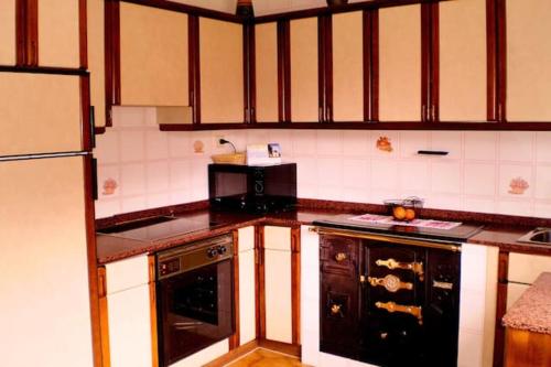Kitchen, Charming apartment in Villamayor 74 m² with mountain view in Villamayor