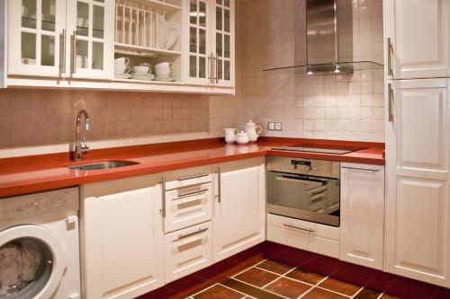 Kitchen, Las Casas Rurales Huerta San Benito in Pilona