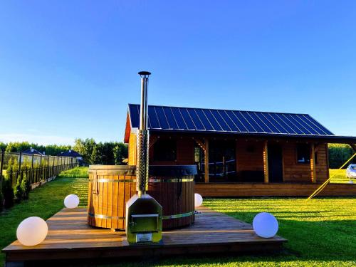 Domek Wypoczynkowy Zacisze w Makosiejach z dostępem do rzeki, z balią i jacuzzi (Domek Wypoczynkowy Zacisze w Makosiejach z dostepem do rzeki, z balia i jacuzzi) in Lisewo