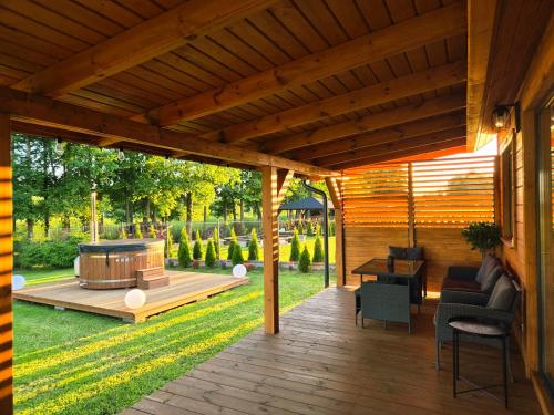 Domek Wypoczynkowy Zacisze w Makosiejach z dostępem do rzeki, z balią i jacuzzi (Domek Wypoczynkowy Zacisze w Makosiejach z dostepem do rzeki, z balia i jacuzzi) in Lisewo