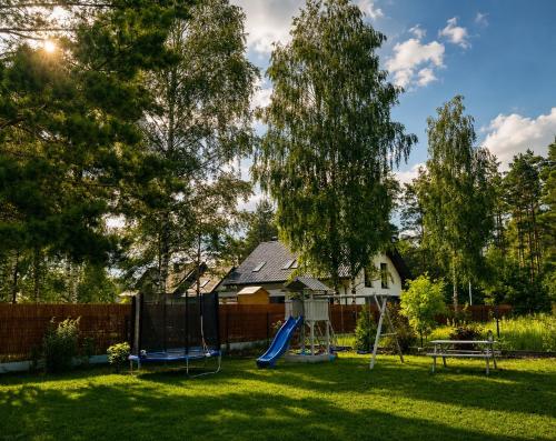 Leśny Apartament V (Lesny Apartament V) in Щитно