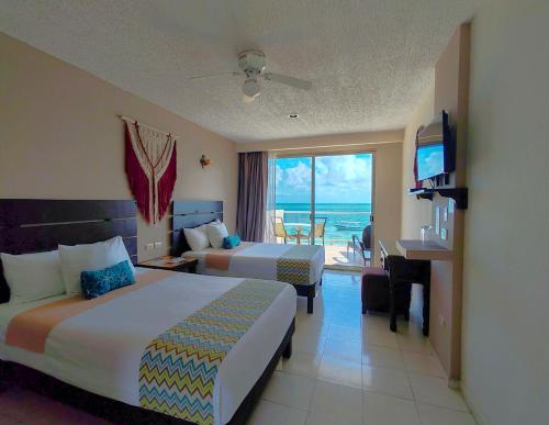 Hacienda Morelos Beach Front Hotel - Tap to explore photos