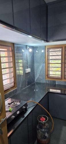 virtuve, Raanthal Woods Homestay in Kodanada