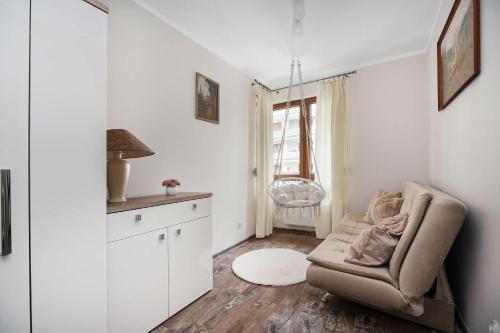Spacious Apartment with a Balcony and Parking by Noclegi Renters - image 4