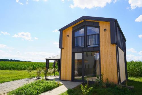 Vista exterior, ALPADRIA Ferienhaus am See in Rauchwart