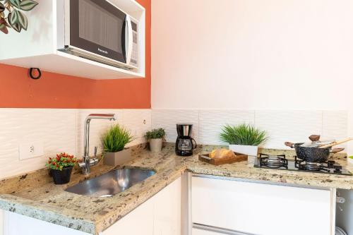 Charmoso na Vila Madalena com AC e Cama Queen in อัลโต เด ปินเยย์โรส