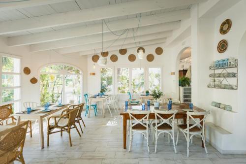 Restaurant, MR Hotelet de la Racona & Apartments in Las Rotas Beach