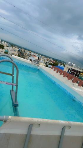 Exterior view of Sofra service apartment by LUXE with swinging pool