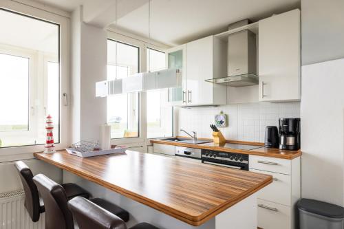Komfortable Ferienwohnung für 2 am Südstrand mit Wintergarten & Meerblick Wohnung 12 in Wilhelmshaven, Deutschland