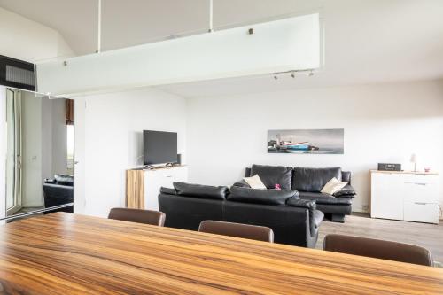 Komfortable Ferienwohnung für 2 am Südstrand mit Wintergarten & Meerblick Wohnung 12 in Wilhelmshaven, Deutschland
