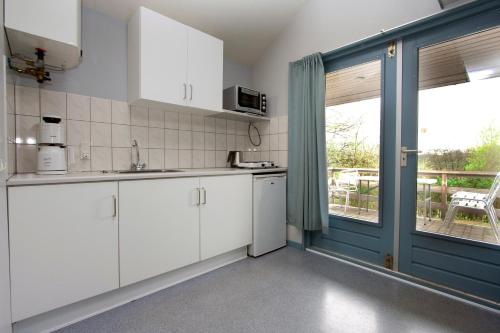 cuina, Løgballe Camping & Cottages in Stouby