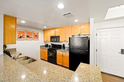 Sun-Drenched Hideaway with Dual Balcony, Pool, & Gym 215 in Sherman Oaks