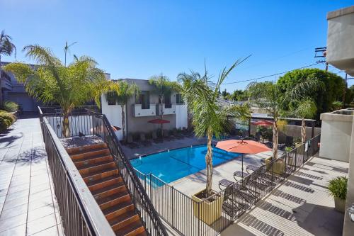 Sun-Drenched Hideaway with Dual Balcony, Pool, & Gym 215 in Sherman Oaks