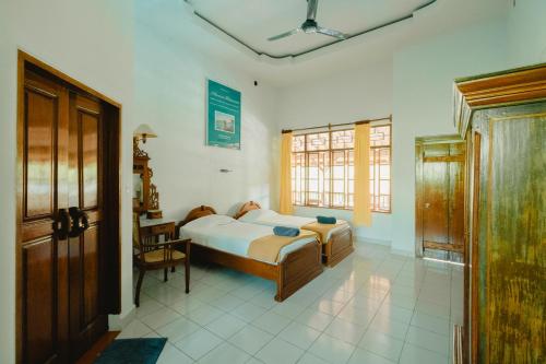 Un's Hotel - Bali Room Type - Deluxe Room