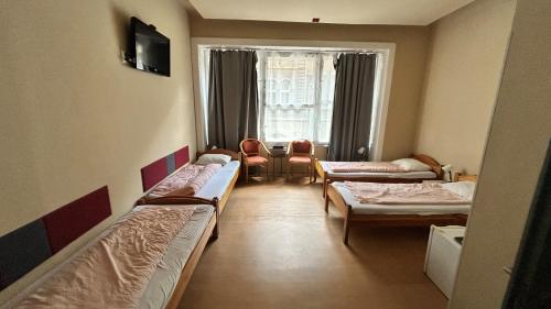 Treestyle Deluxe Rooms Room Type - Quadruple Room with Bathroom