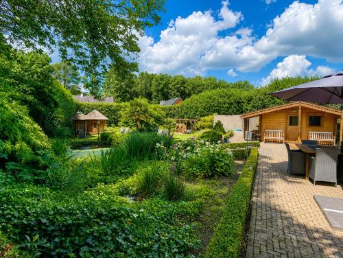 Сад, Paping Hotel & Spa                                                               in Оммен