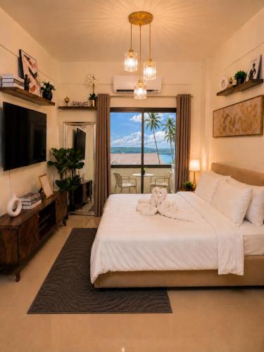 CASA CHOY SUITES Cozy & Elegant 1BR Condo with Balcony Island Escape at Kembali Coast Samal Island