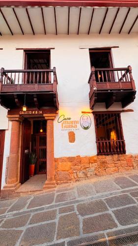 Casa Mami Luisa Huéspedes y Café