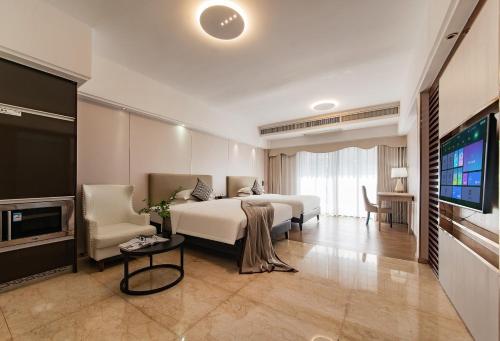 RoomMe HOTEL寓洣公寓佛山铂顿祖庙岭南天地店, Foshan (Foto 3)
