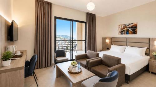 Koplietošanas atpūtas telpa ar TV, Iris Flower Hotel in Jezzine