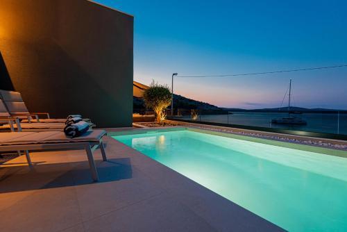 Surrounding environment, Villa Venetta,beach house,pool,jacuzzi,satellite internet-WiFi,4x4 UTV vehicle,SUP board,Island Zirj in Zirje