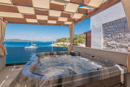 Surrounding environment, Villa Venetta,beach house,pool,jacuzzi,satellite internet-WiFi,4x4 UTV vehicle,SUP board,Island Zirj in Zirje