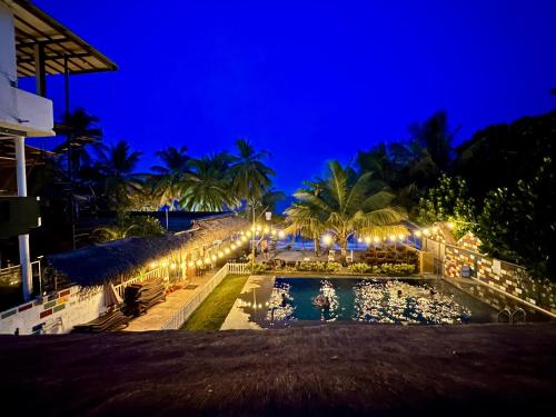 景色, フランジパニ ビーチ ヴィラ (Frangipani Beach Villa) in タンガラ