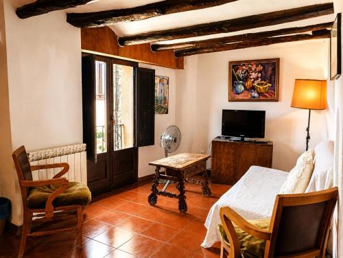 Közös társalgó / TV, Casa amb terrassa i vistes a la vall - Cal Taverner in Montsonis