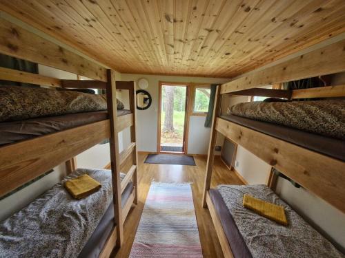Log home in the woods in Skaulo