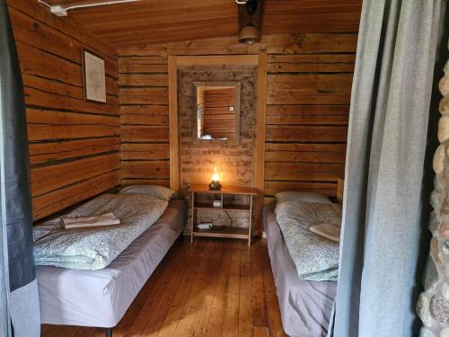 Log home in the woods in Skaulo
